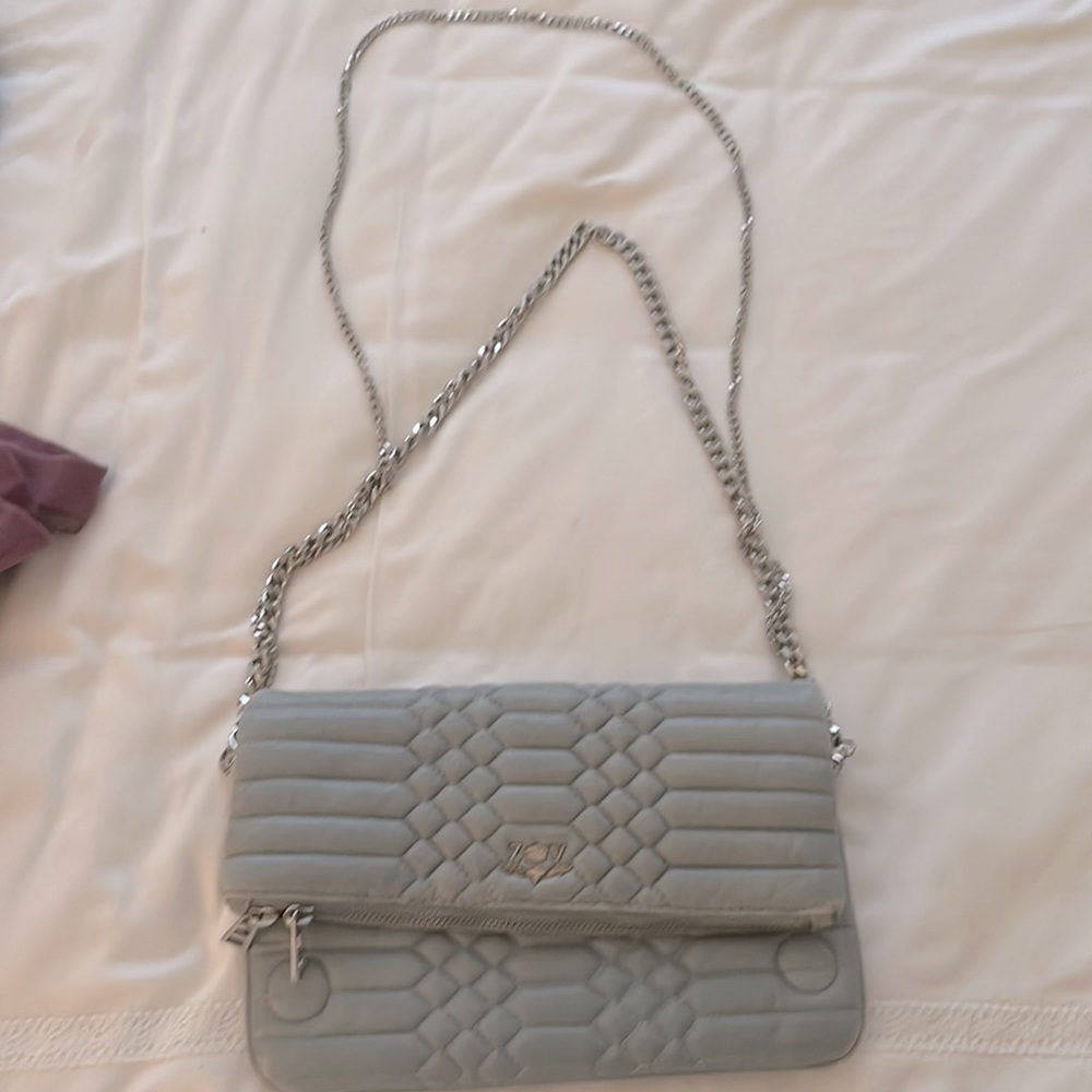 Blue bag used , you can see that it’s used (corner discoloration